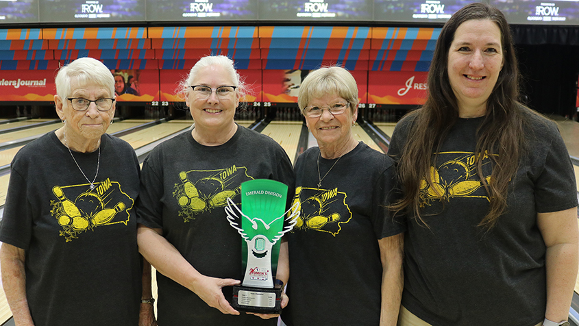 Iowa 7 with the Emerald Division Trophy for their team win at the 2023 Women's Championships